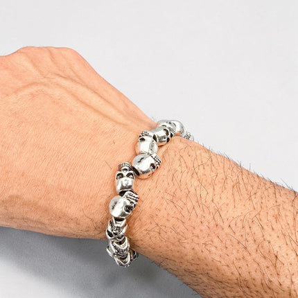 FB3249  SILVER SKULL BEADS  STRETCH BRACELET