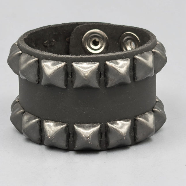 BC137PLN  2 ROW 1/2" PYRAMID STUD SNAP BRACELET  1 3/4" WIDE