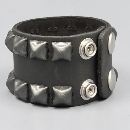 BC137PLN  2 ROW 1/2" PYRAMID STUD SNAP BRACELET  1 3/4" WIDE