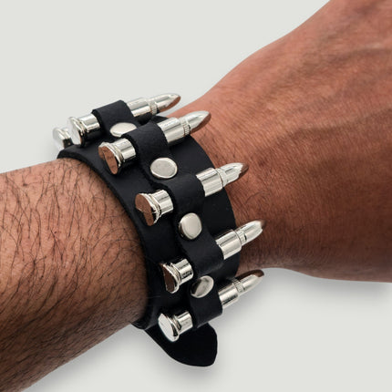 BC227  SMALL SILVER  OR BLACK BULLET BUCKLE BRACELET 1 1/4" WIDE