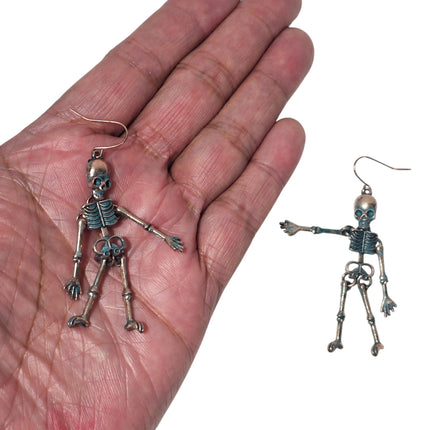 ER55493 HANGING SKELLITON EARRING