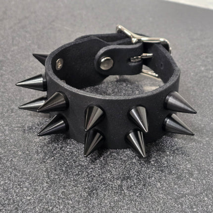 FB425  BUCKLE BRACELET WITH 2 ROW CONE  SPIKES